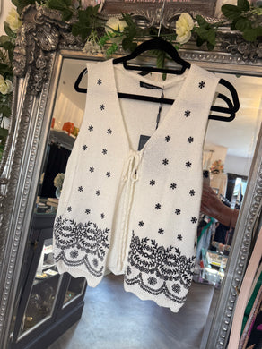 White and navy knitted waistcoat